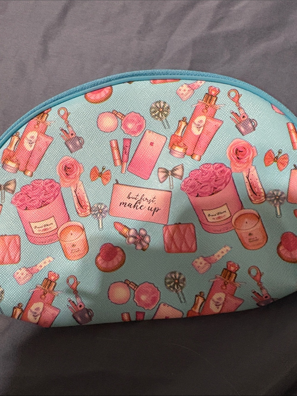 Blue Cosmetic Makeup Bag with Fun Print and assorted make up. - Picture 2 of 16